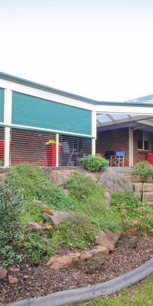 slidetrack-motorised-verandah-blinds-green